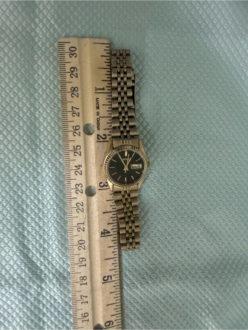 Seiko Gold-Tone Watch with Black Dial